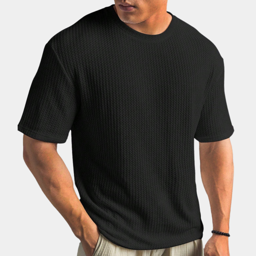 Grijs heren T-shirt met textuur, korte mouwen en ronde hals. Comfortabele pasvorm, ideaal voor casual outfits. Perfect voor dagelijks gebruik.