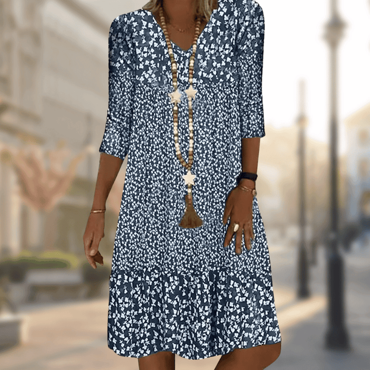 Solara | Robe midi à col en V et motif floral pour femme