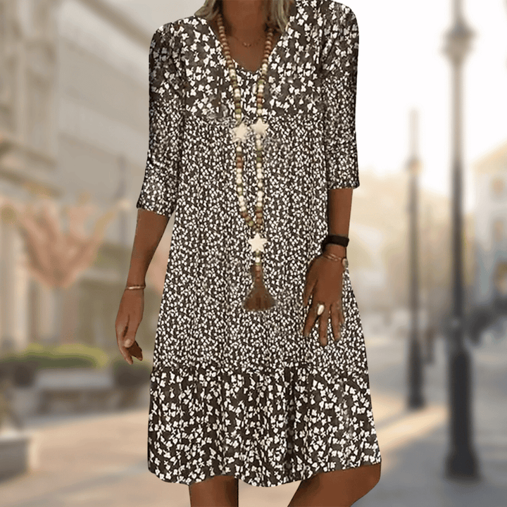 Solara | Robe midi à col en V et motif floral pour femme
